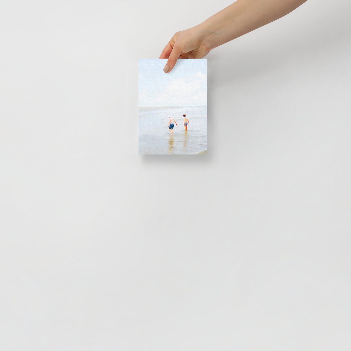 Beach Day 2 coastal print with children at play near the water’s edge, displayed in a bright, playful home office setting.