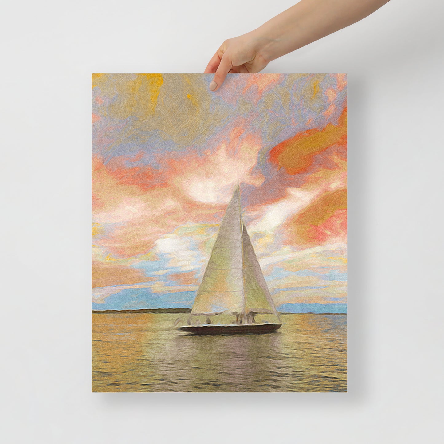 Close-up of Sailing Through the Fiery Sky print, highlighting vivid orange and red sunset tones with a sailboat in the distance.