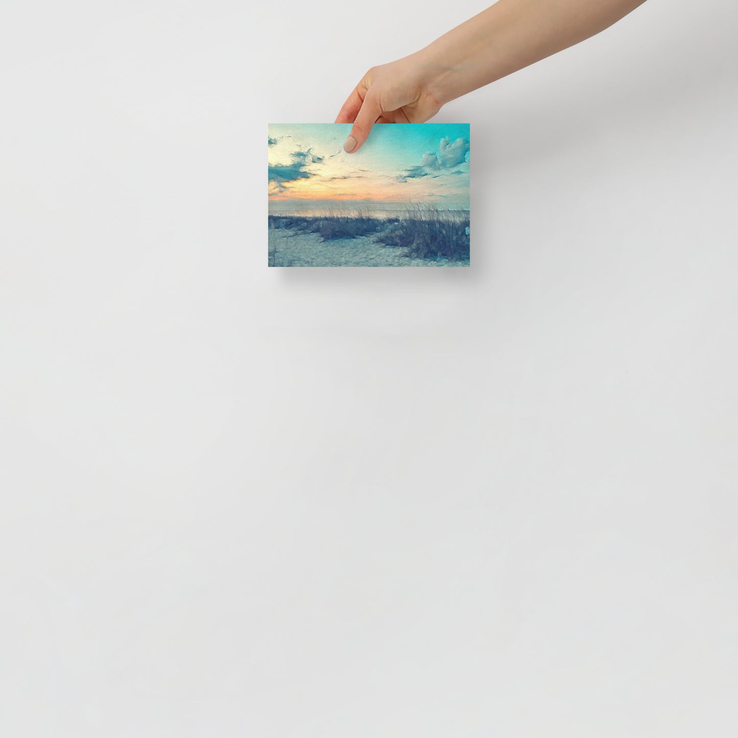 The Path to Light coastal landscape print with soft morning colors over the shoreline, displayed in minimalist office decor for a calming effect.